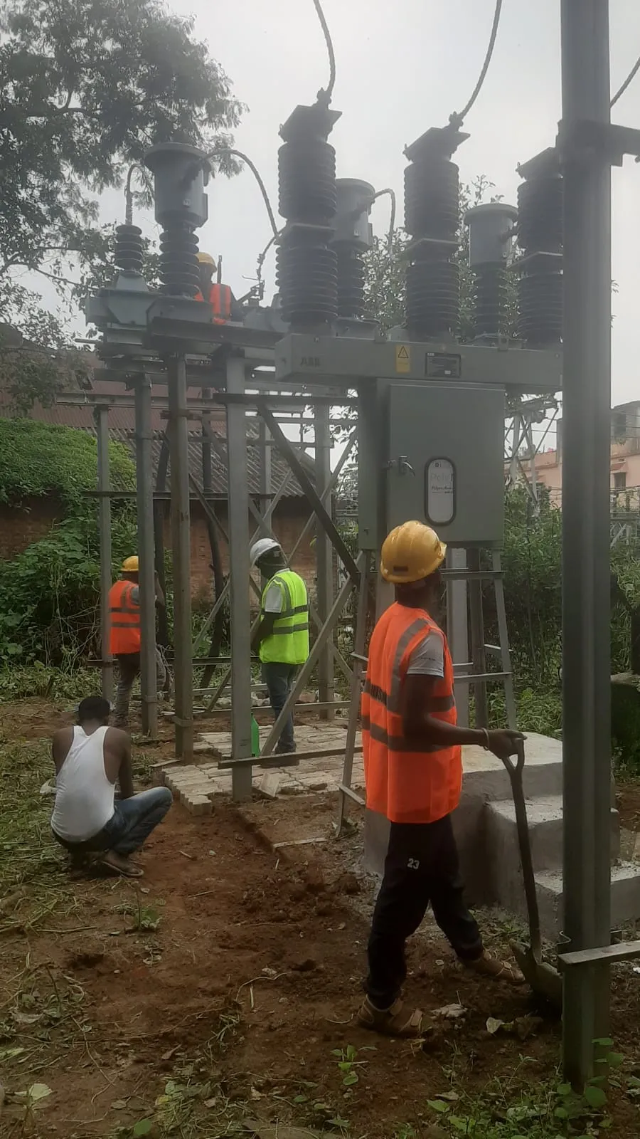 High-tension switchgear and post insulators mounted on a completed steel structure