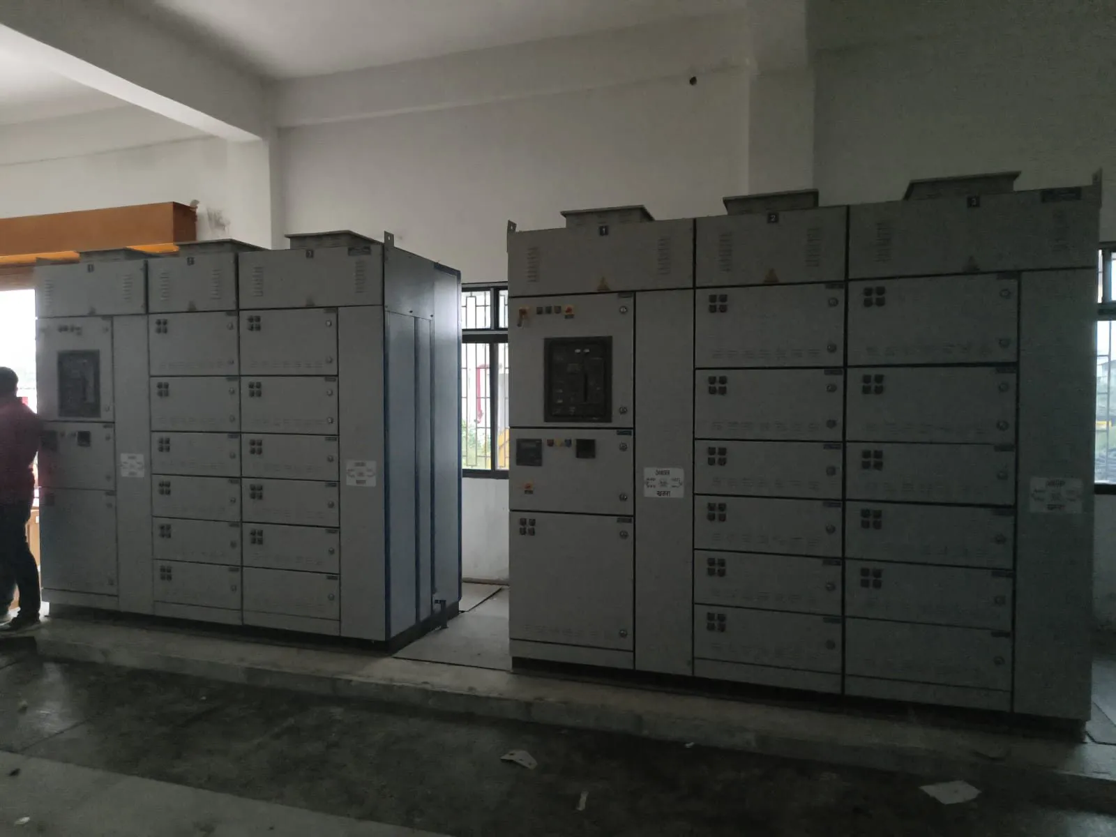 LT switchgear panels installed in a finished room with cable trench covers down